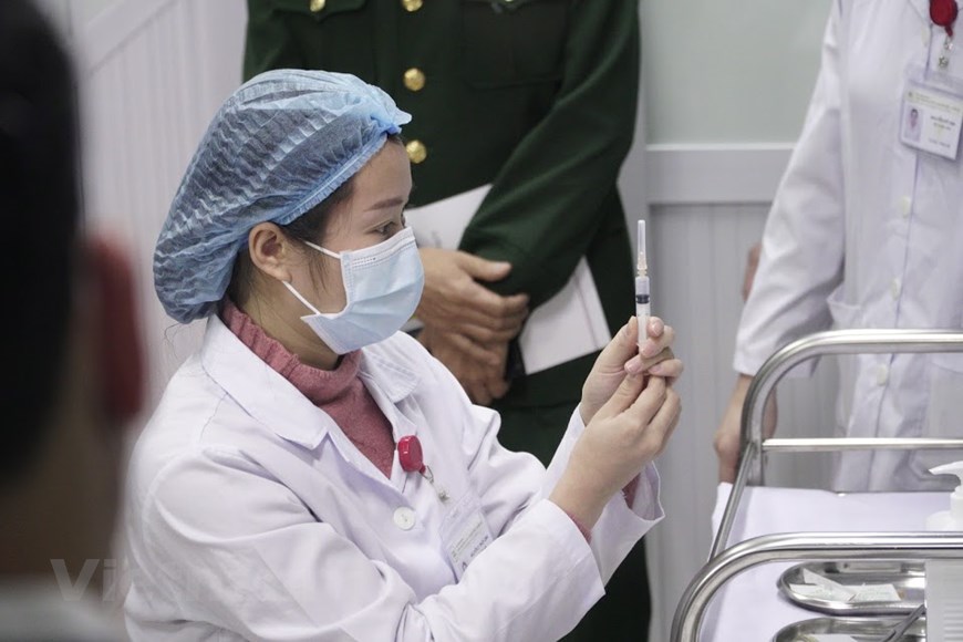 Hình ảnh ca tiêm thử nghiệm vaccine ngừa COVID-19 đầu tiên của Việt Nam - Ảnh 5.