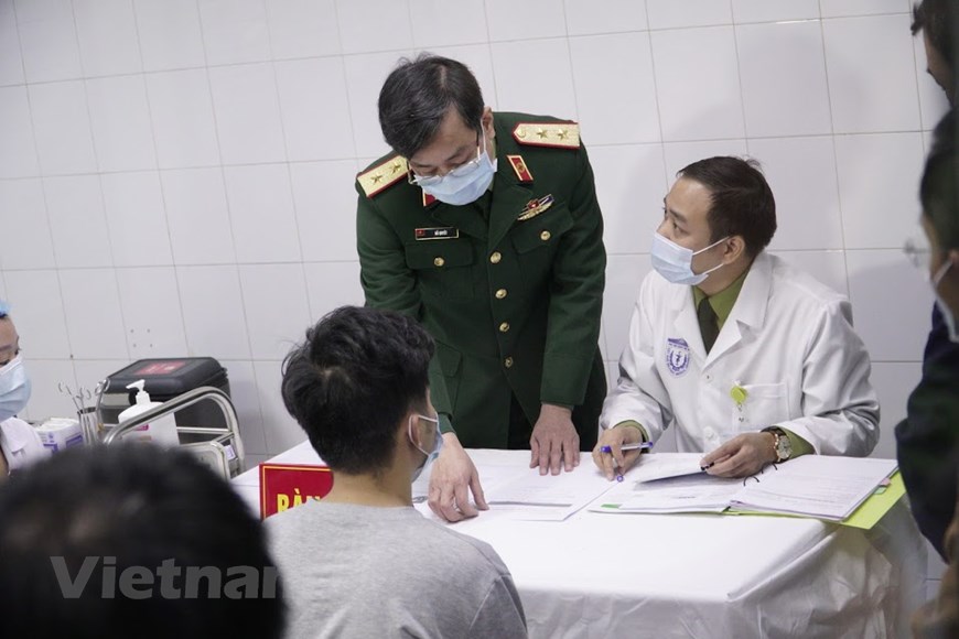 Hình ảnh ca tiêm thử nghiệm vaccine ngừa COVID-19 đầu tiên của Việt Nam - Ảnh 8.