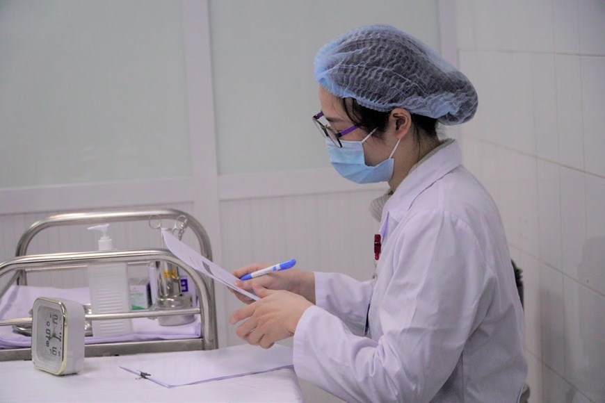 Hình ảnh ca tiêm thử nghiệm vaccine ngừa COVID-19 đầu tiên của Việt Nam - Ảnh 10.