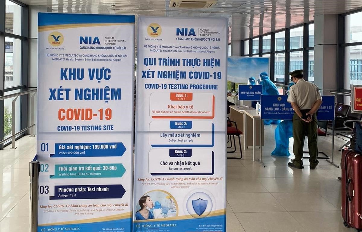 Dừng dịch vụ test nhanh COVID-19 cho khách tại sân bay Nội Bài  - Ảnh 1.