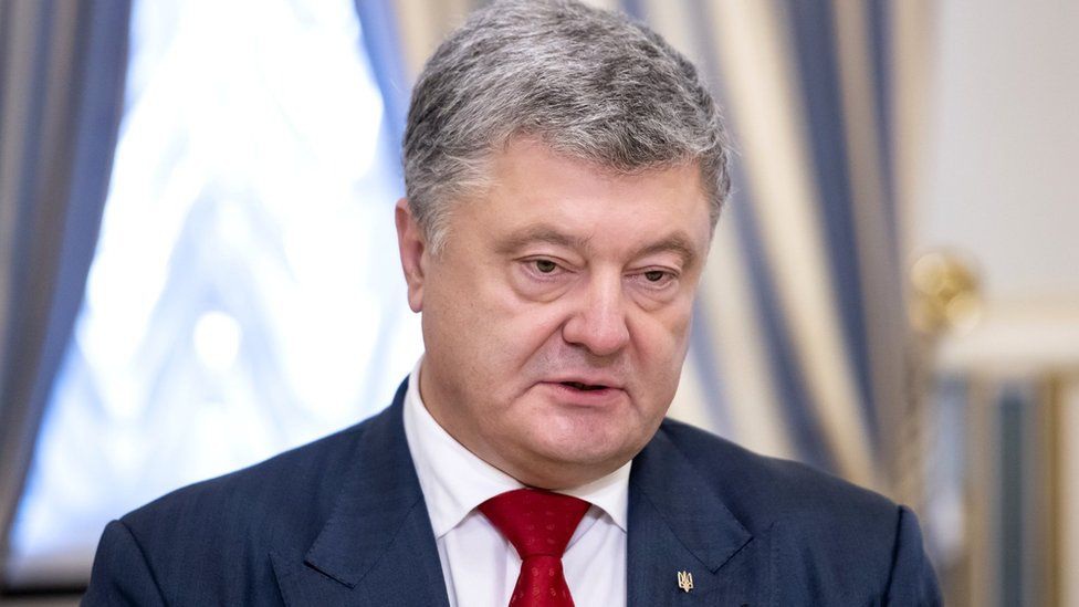 Cựu Tổng thống Ukraine bị cáo buộc phản quốc - Ảnh 1.