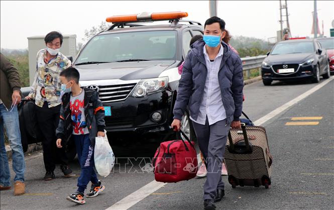 COVID-19: Người lao động rời Quảng Ninh về quê ăn Tết sớm - Ảnh 5.