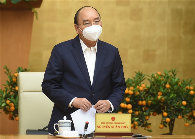 Thủ tướng đồng ý cho TPHCM, Hà Nội có thể giãn cách xã hội - Ảnh 1.