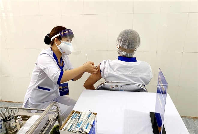 Chuyên gia: Phản ứng phụ của vaccine COVID-19 tại Việt Nam trong ngưỡng cho phép - Ảnh 4.