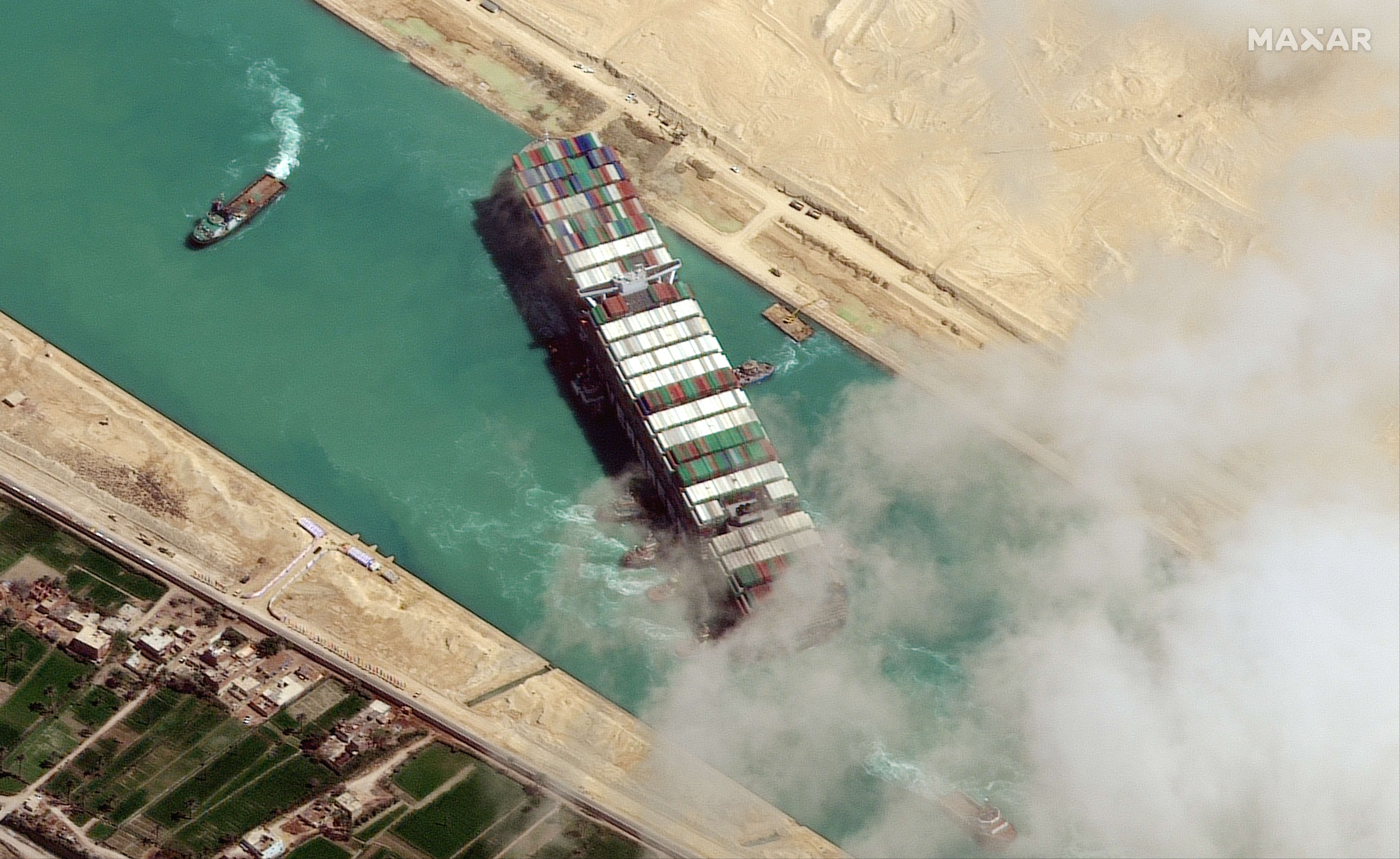 Kênh đào Suez thông lại, chuỗi cung ứng sẽ vẫn gián đoạn nhiều tháng - Ảnh 1.