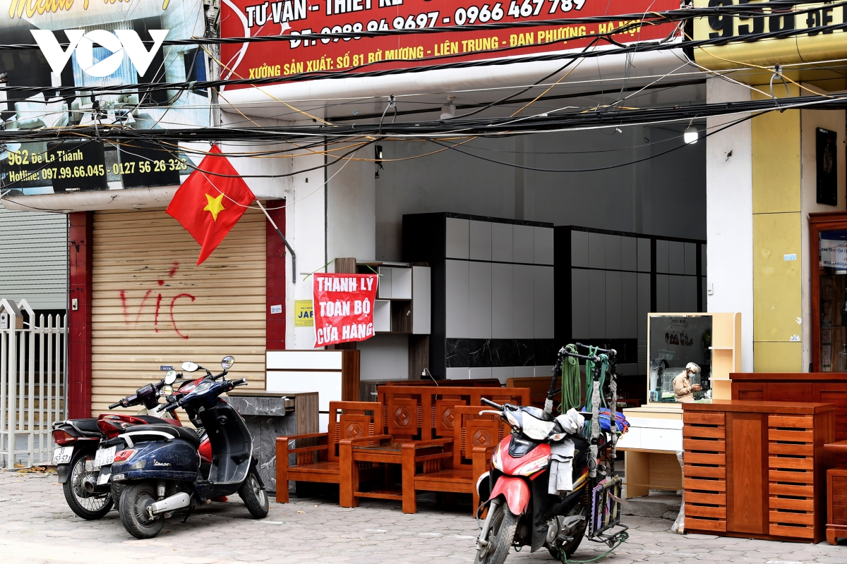 Hình ảnh các cửa hàng kinh doanh tại Hà Nội đóng cửa vì dịch Covid-19 - Ảnh 9.