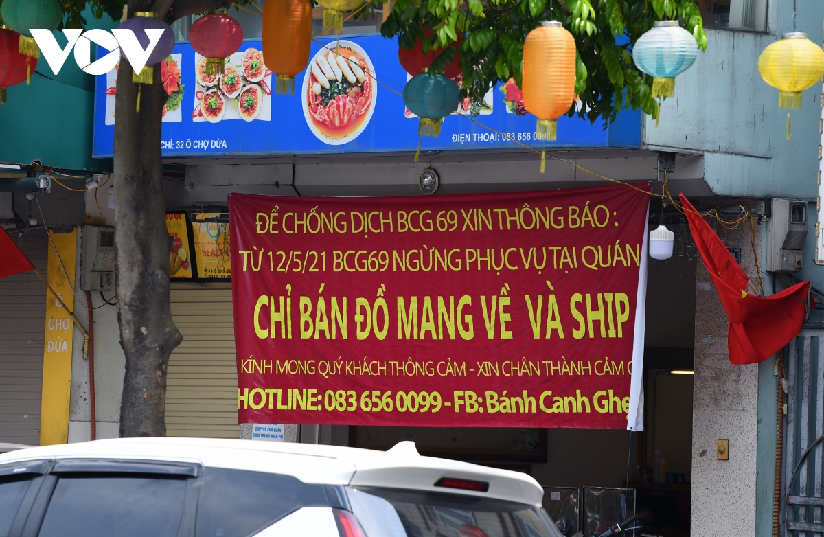 Hình ảnh các cửa hàng kinh doanh tại Hà Nội đóng cửa vì dịch Covid-19 - Ảnh 10.
