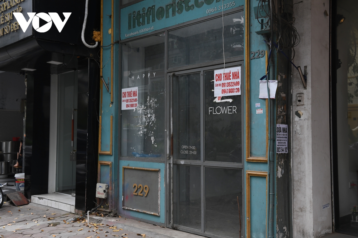 Hình ảnh các cửa hàng kinh doanh tại Hà Nội đóng cửa vì dịch Covid-19 - Ảnh 14.