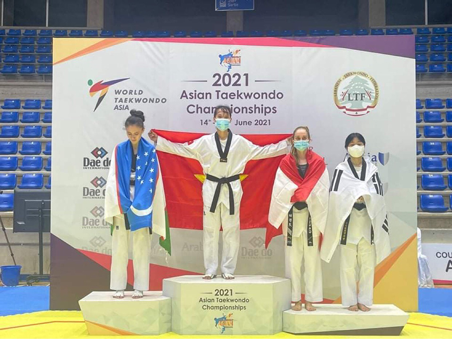 Võ sĩ Trương Thị Kim Tuyền giành Huy chương vàng Taekwondo châu Á 2021 - Ảnh 1.