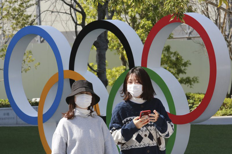Khoảng 10.000 tình nguyện viên Olympic Tokyo rút lui - Ảnh 1.