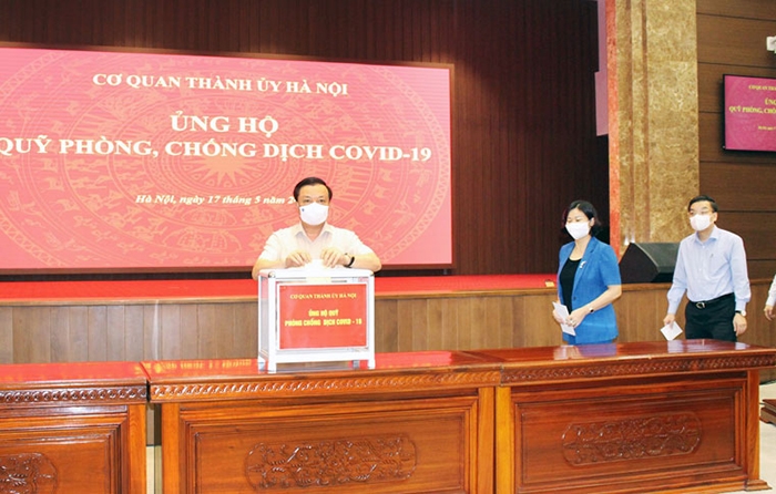 Hà Nội hưởng ứng mua vaccine cho thành phố 1.000 tỷ đồng và ủng hộ Quỹ vaccine 100 tỷ đồng - Ảnh 1.