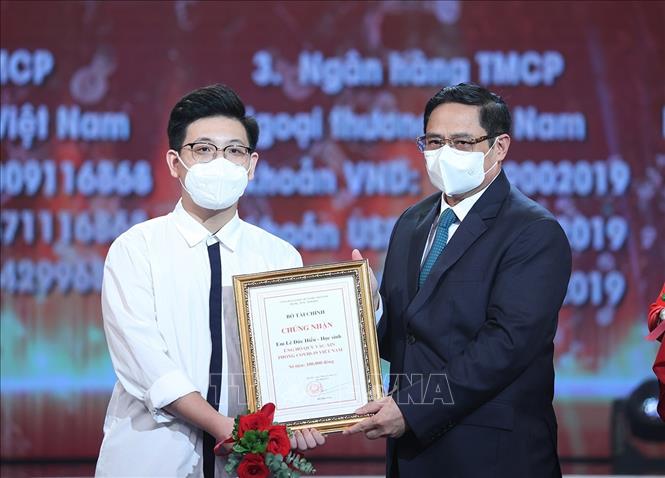 Thủ tướng Chính phủ Phạm Minh Chính dự Lễ ra mắt Quỹ vaccine phòng COVID-19 - Ảnh 7.