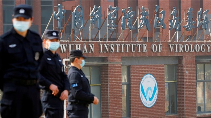 Trung Quốc bác lời kêu gọi điều tra nguồn gốc COVID-19 mới của WHO - Ảnh 1.