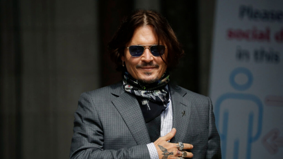 Johnny Depp bị Hollywood tẩy chay sau vụ thua kiện đánh vợ cũ - Ảnh 1.