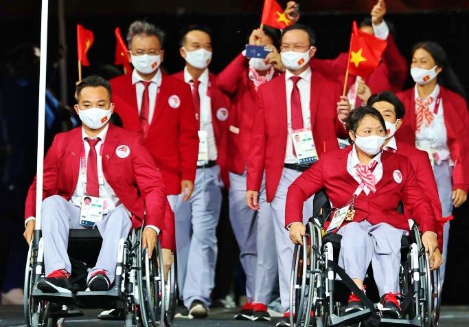 Đoàn Thể thao Việt Nam rạng rỡ tại Lễ khai mạc Paralympic Tokyo 2020 - Ảnh 2.