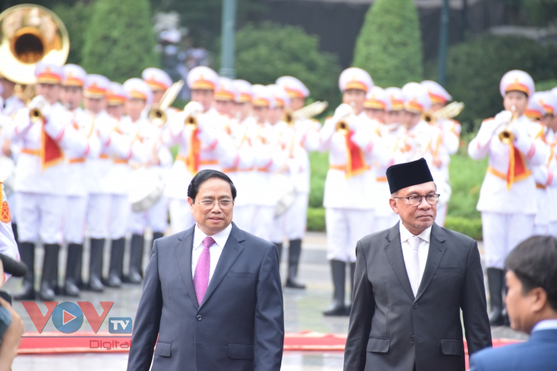 Thủ tướng Chính phủ Phạm Minh Chính đón và Hội đàm với Thủ tướng Malaysia Anwar Ibrahim - Ảnh 5.