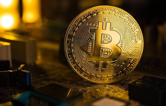 Lập kỷ lục mới về giá, Bitcoin vượt ngưỡng 21.000 USD - Ảnh 1.