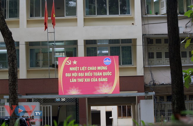 Đường phố TPHCM lung linh rực rỡ cờ hoa chào mừng Đại hội Đảng toàn quốc lần thứ 13 - Ảnh 13.