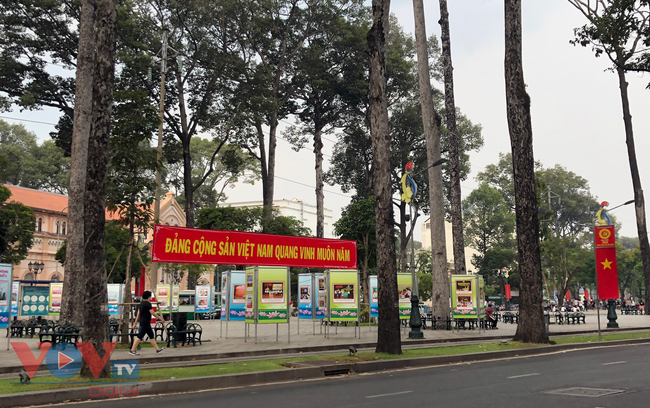 Đường phố TPHCM lung linh rực rỡ cờ hoa chào mừng Đại hội Đảng toàn quốc lần thứ 13 - Ảnh 16.