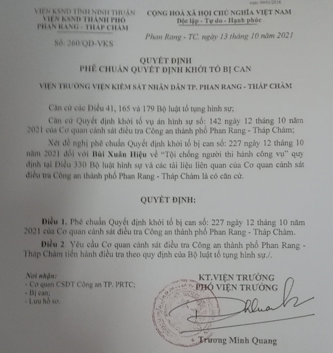 Ninh Thuận: Bắt tạm giam hai thanh niên 'thông chốt' kiểm soát phòng chống dịch - Ảnh 2.