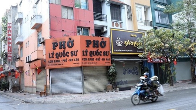 Hà Nội chỉ yêu cầu đóng cửa các quán ăn đường phố, ngồi ngoài vỉa hè - Ảnh 2.