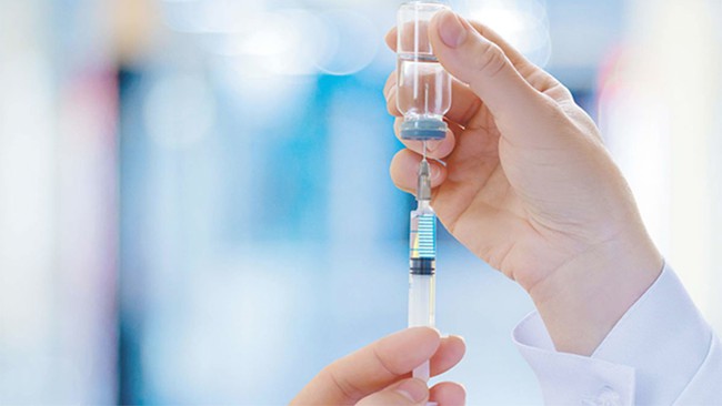 Australia ghi nhận trường hợp mắc Covid-19 sau khi tiêm vaccine - Ảnh 1.