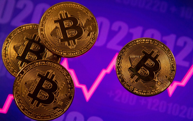 Giá trị đồng Bitcoin lần đầu vượt ngưỡng 62.000 USD - Ảnh 1.