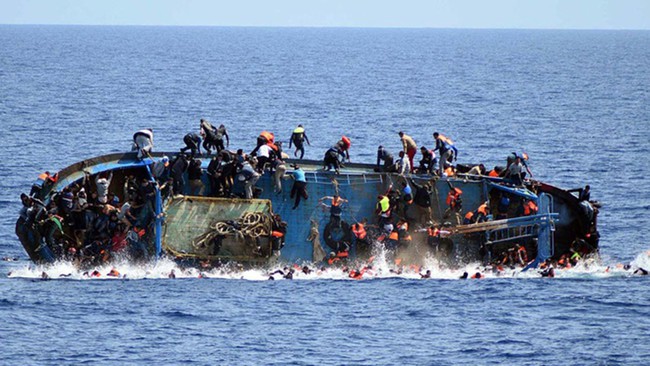 Chìm thuyền ngoài khơi Tunisia khiến hàng chục người di cư thiệt mạng - Ảnh 1.