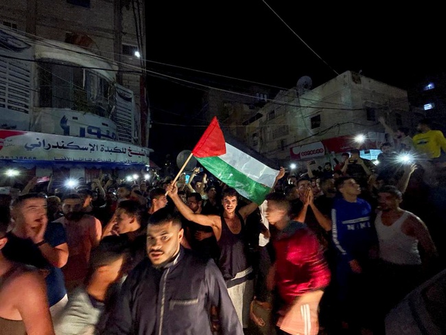 Xung đột Israel-Palestine: Israel nhất trí ngừng bắn với Hamas - Ảnh 1.