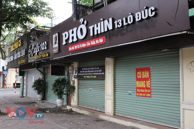 Hà Nội: Nhà hàng, quán cà phê 'trở lại' sau thời gian đóng cửa vì dịch Covid-19 - Ảnh 15.