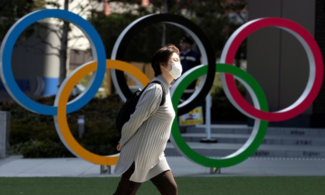 COVID-19 chồng thêm thách thức cho BTC Olympic Tokyo 2020 - Ảnh 1.