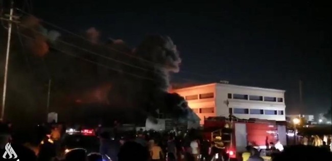 Iraq: Cháy bệnh viện cách ly bệnh nhân Covid-19, hàng chục người thiệt mạng - Ảnh 1.