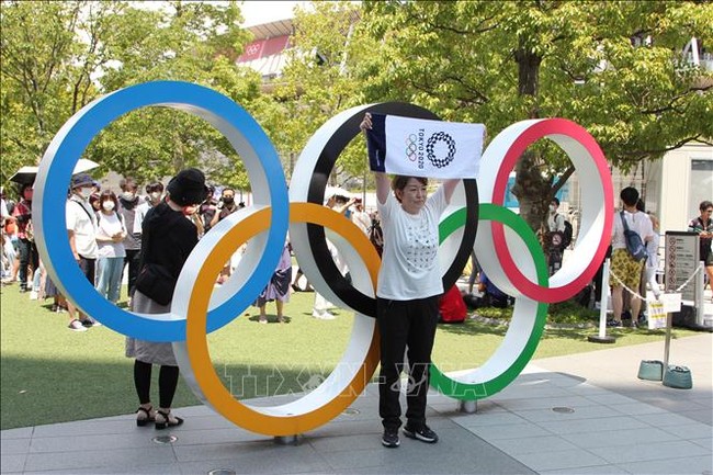 Olympic Tokyo 2020: Tokyo 'nóng' trước giờ khai mạc - Ảnh 2.