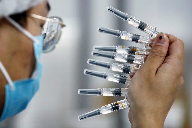 Trung Quốc đang nghiên cứu và phát triển 71 loại vaccine COVID-19 - Ảnh 1.