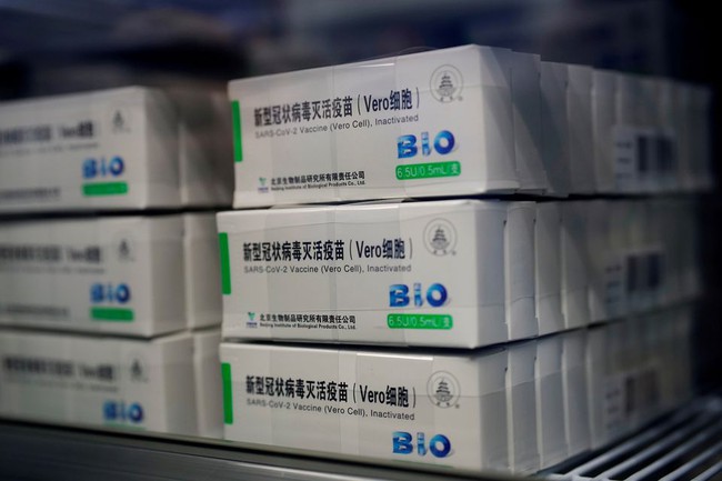 Tiếp nhận 200.000 liều vaccine Covid-19 do Bộ Quốc phòng Trung Quốc tặng Bộ Quốc phòng Việt Nam - Ảnh 1.
