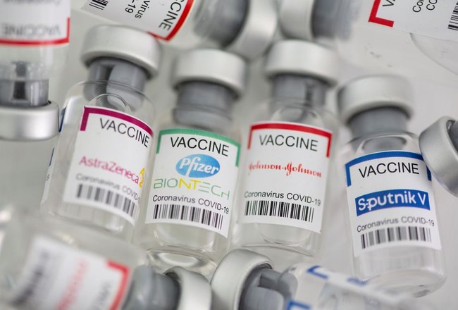 Mỹ tiếp tục khuyến khích người dân tiêm tăng cường vaccine Covid-19 - Ảnh 1.