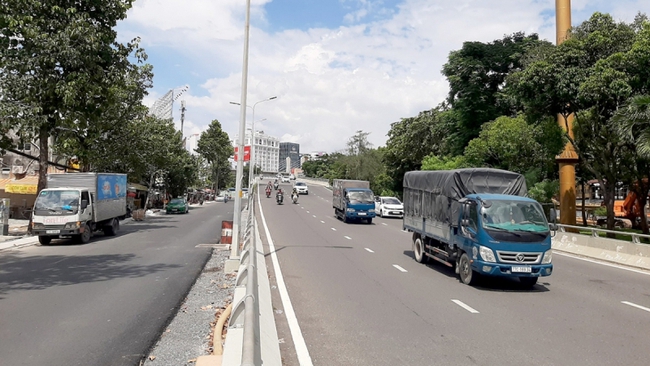 TP.HCM cho phép xe máy lưu thông trên cầu vượt Nguyễn Hữu Cảnh - Ảnh 3.