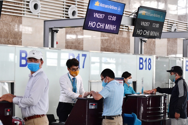 Vietnam Airlines ra mắt sản phẩm bảo hiểm chậm hủy chuyến - Ảnh 1.