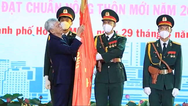 Huyện Bình Chánh đạt chuẩn nông thôn mới và đón nhận huân chương lao động hạng Ba - Ảnh 1.
