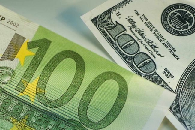 Tỷ giá Euro – USD 'thủng đáy' - Triển vọng ảm đạm với kinh tế châu Âu. - Ảnh 1.