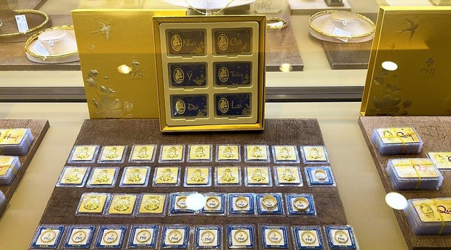 Giá vàng giảm 400 nghìn đồng/lượng trước ngày Vía Thần tài - Ảnh 1.