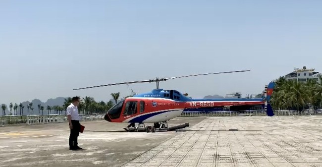Dồn lực tìm kiếm các nạn nhân trong vụ máy bay Bell 505 bị nạn trên vùng biển Quảng Ninh - Hải Phòng - Ảnh 1.