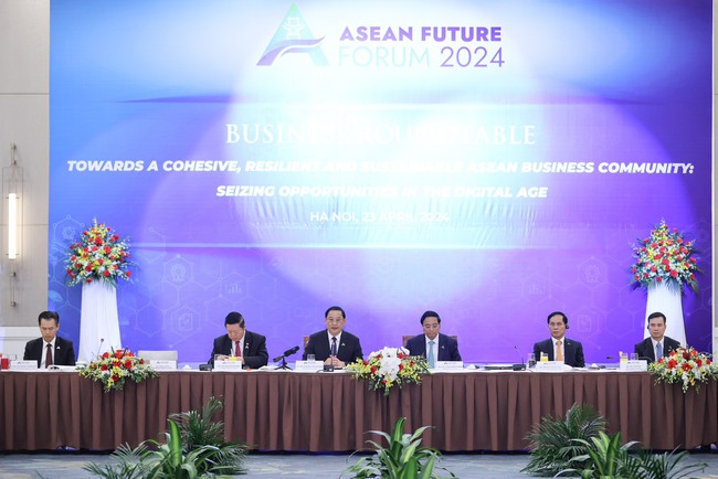 Thủ tướng Việt Nam và Thủ tướng Lào chủ trì tọa đàm với doanh nghiệp ASEAN và các đối tác- Ảnh 1.